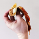 hand holding floppy pizza